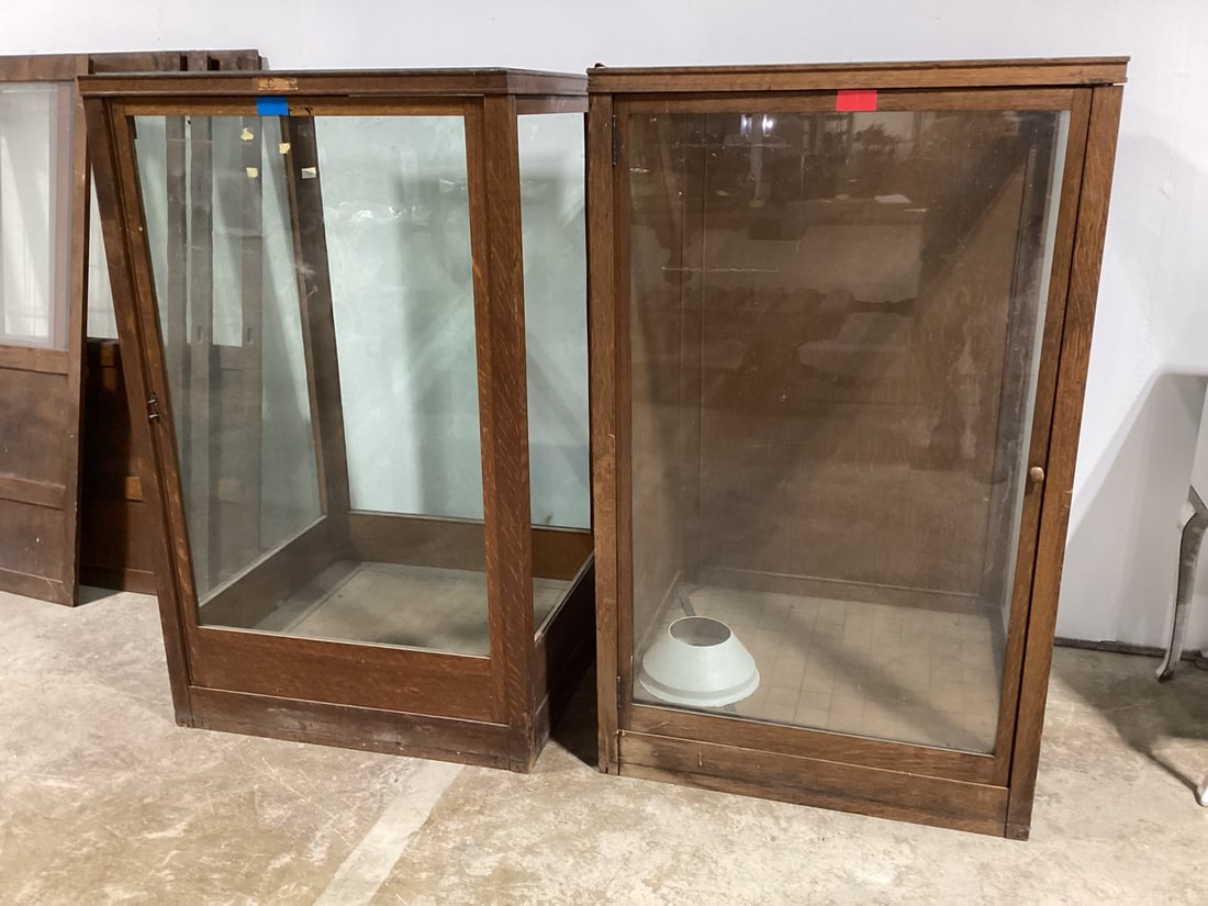 2 Glass and wood showcases: 62.5x38x36; NOTE: Spry's & Goin' Postal cannot ship this item. If the buyer wishes to have this item shipped, they must arrange their own third party shipper. Local pickup will be available duirng the