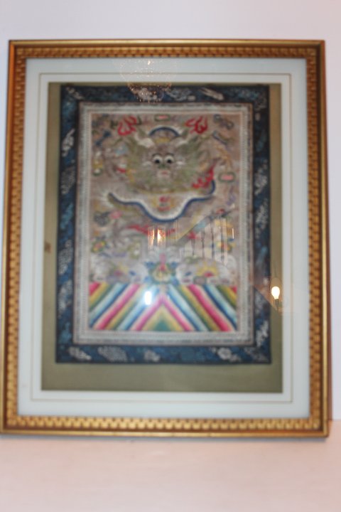 Three pieces, two framed Chinese woodcut paintings if: Three pieces, two framed Chinese woodcut paintings if birds, late 1800's frames are 14 1/2" x 19 1/4", paintings are 9 1/2" x 14 3/4" and a framed Oriental embroidered panel, frame is 17 1/4" x 21 1/4