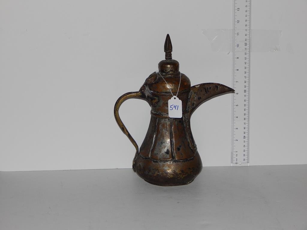 Three middle eastern pitchers, made of copper, metal: Three middle eastern pitchers, made of copper, metal and cast iron, good age, range in size 11"H up to 12 1/4"H ref.#541,581,628