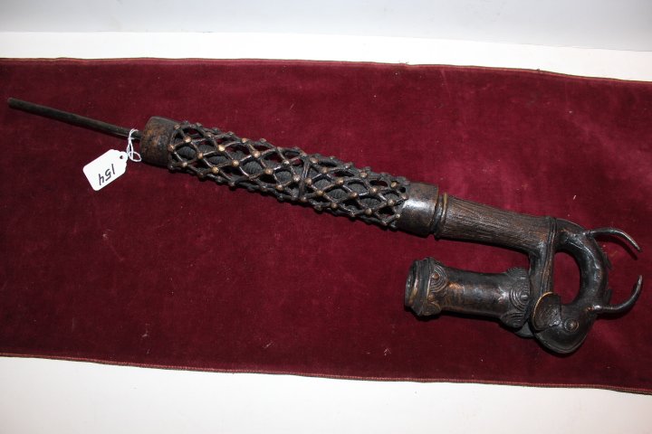 Ornamental bronze pipe, two pieces, the pipe rests on: Ornamental bronze pipe, two pieces, the pipe rests on what appears to be a figural mouse base, 24 3/4"L no ref.#