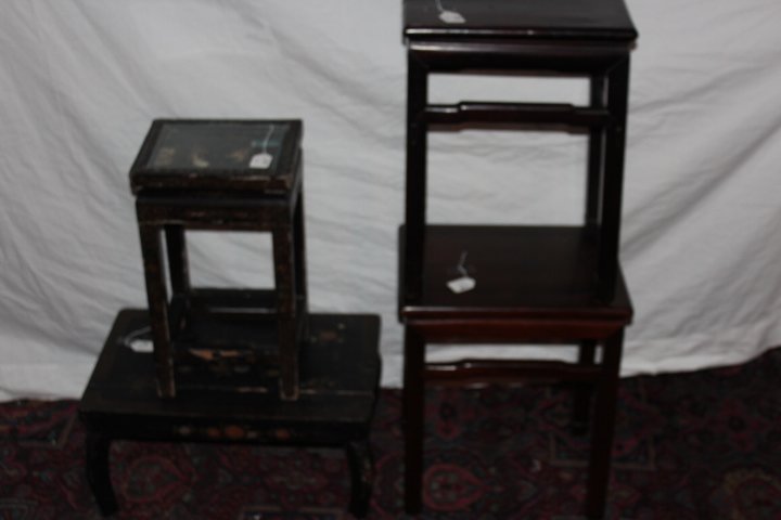Four Oriental stands, two similar teak stands 19 3/4"H: Four Oriental stands, two similar teak stands 19 3/4"H top is 12" x 16 1/2" and 20"H top is 10" x 14 1/2", small decorated black lacquered stand, 10 1/2"H top is 13 1/2" x 21 1/2" top has been repaire