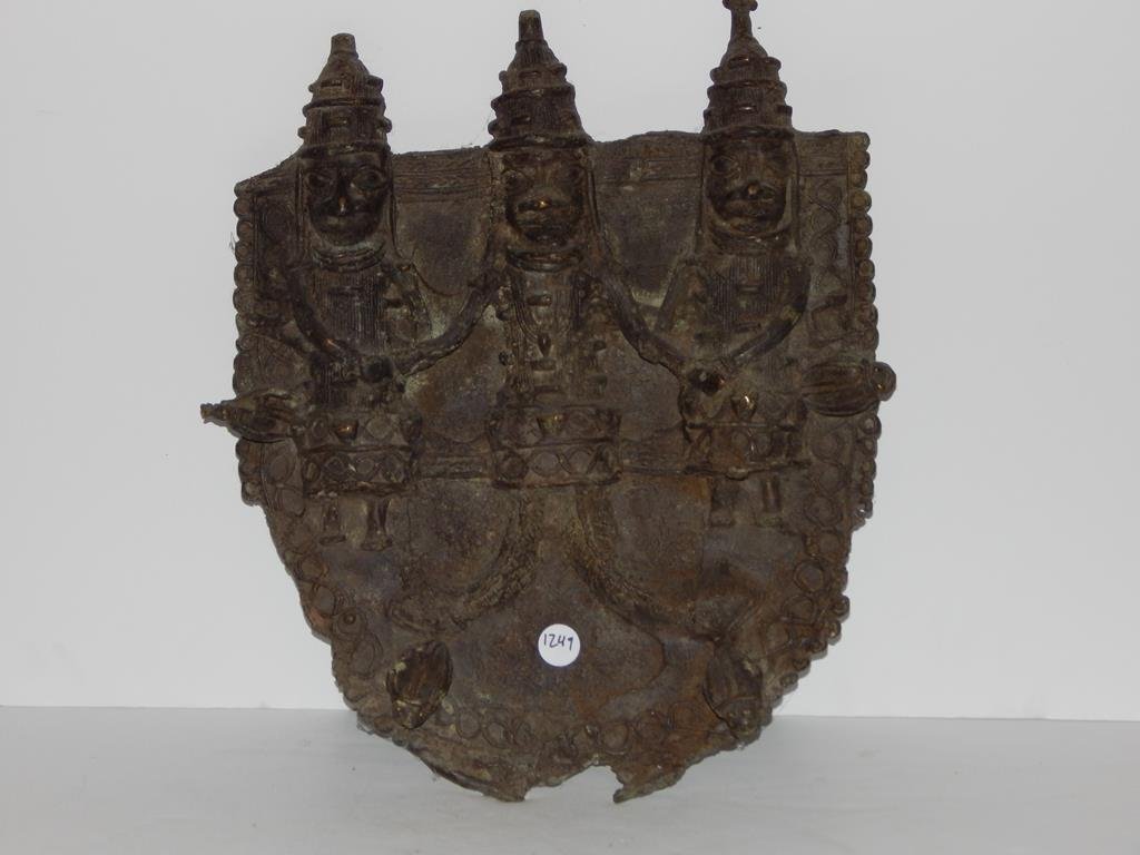 African metal plaque (brass/bronze?), depicting three: African Benin Bronze plaque, depicting three figures holding hands, beetles, the man in the middle has snake for feet, very heavy, minor damage ref.#1249
