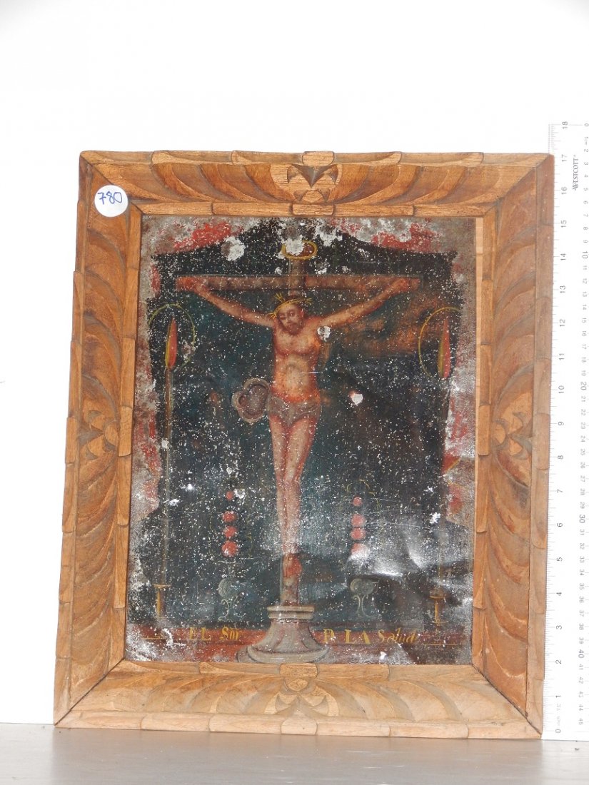 Two pieces, two Retablo paintings on tin 18th century: Two pieces, two Retablo paintings on tin 18th century Mexican/Central American in a beautifully carved frame, frame is 14 1/4" x 17 1/2" painting is 7" x 9 3/4" minor paint loss the other depicts the 