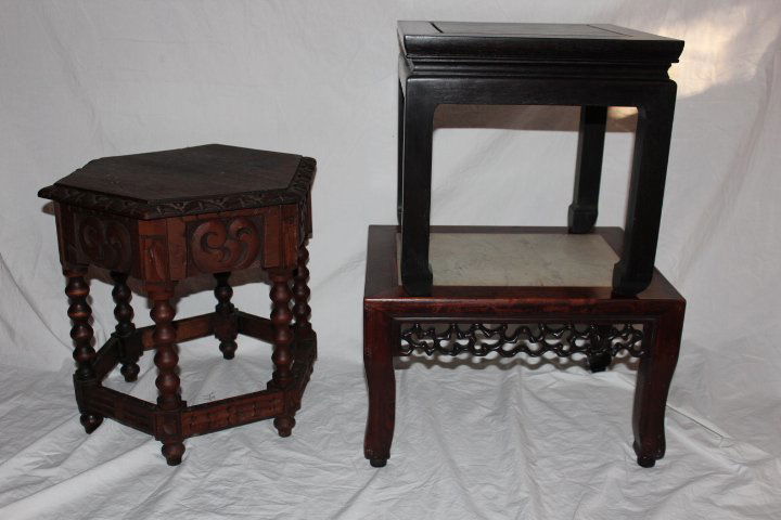 Three stands, teak with marble inset top 11"H top is 13: Three stands, teak with marble inset top 11"H top is 13 3/4" x 18", small wooden stand 14"H top is 14" x 14" and a six sided stand with spool legs 16 1/2"H 15 1/2"D no ref.#