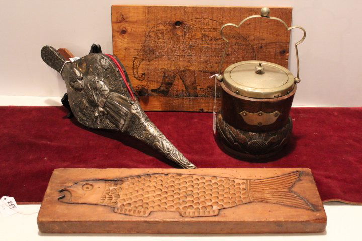 Four pieces, wooden cookie board, fish, dog, cat,: Four pieces, wooden cookie board, fish, dog, cat, chicken 17 1/2"L 4 3/4"W, oak biscuit or cracker jar with silver plate lid & handle, 7"H, pair of bellows with metal figural decoration 17"L and a woo