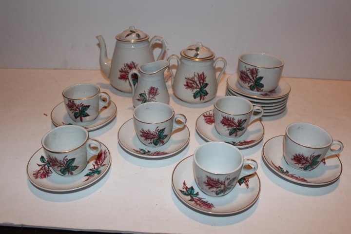 Twenty two piece miniature tea set "moss rose" pattern,: Twenty two piece miniature tea set "moss rose" pattern, teapot, cream, sugar, waste bowl, six cups, six saucers & six plates condition is good, unmarked no ref. #