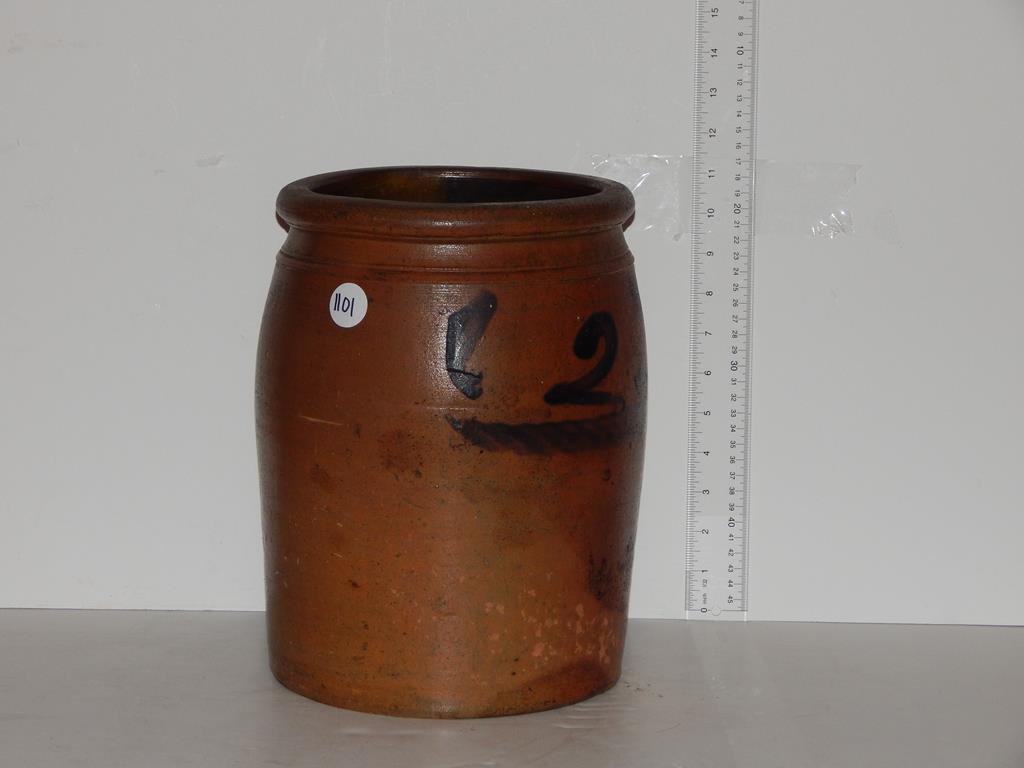 Two gallon crock with cobalt decoration, small chip on: Two gallon crock with cobalt decoration, small chip on the base & minor flaking, 11 1/2"H ref.#1101