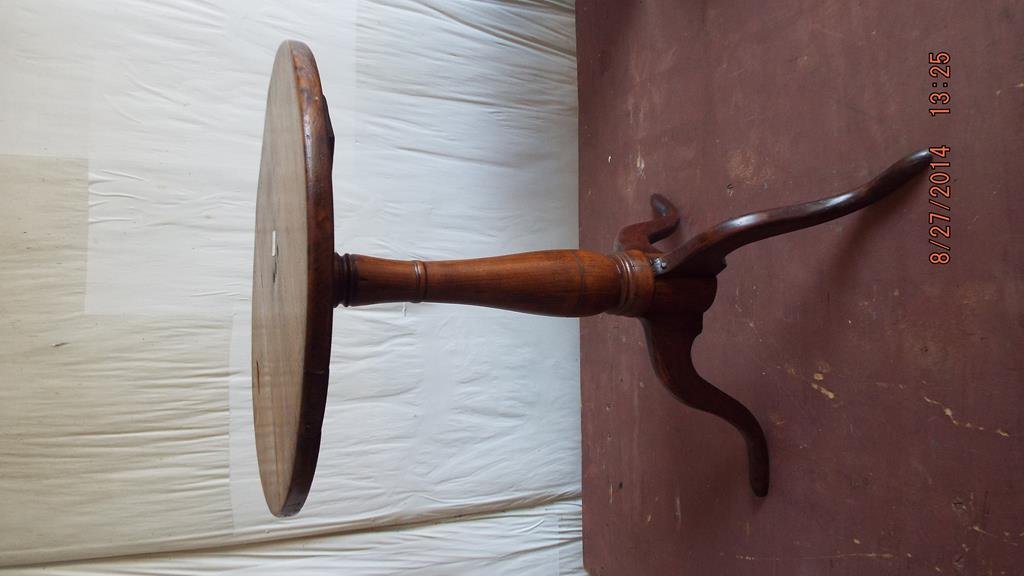 Early American candle stand resting on snake feet, top: Early American candle stand resting on snake feet, top 19"D 26"H no ref.#
