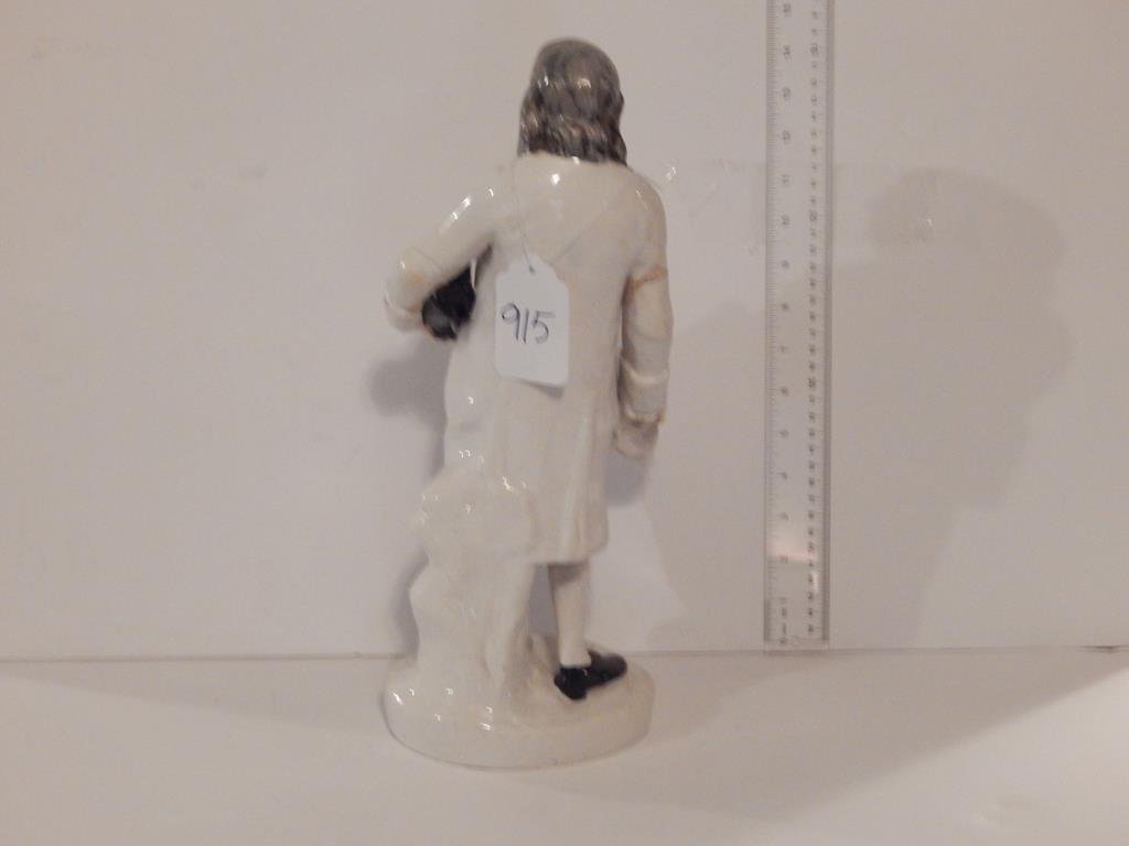 Staffordshire figure of Ben Franklin though on the base: Staffordshire figure of Ben Franklin though on the base it has general Washington's name, left arm has been broken and repaired at the elbow, 15 1/2"H ref.#915