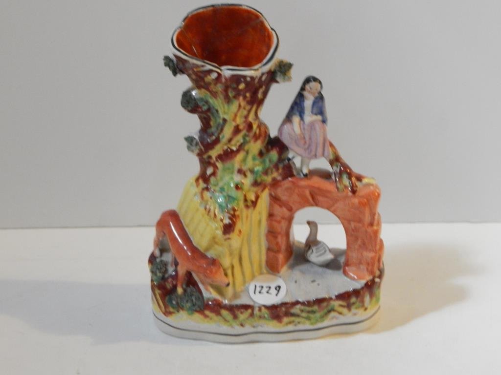 Two Staffordshire spill vases, one with girl on bridge: Two Staffordshire spill vases, one with girl on bridge has repaired damage to the top of the vase 9"H and the other is 8 1/2"H condition is good, ref.#1229, 1040