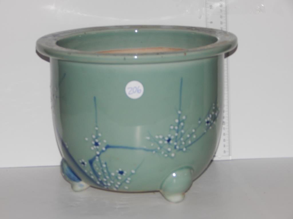 Three ceramic planters, oriental design with two horses: Three ceramic planters, oriental design with two horses & under tray 9"H 10 1/2"D, Oriental design with pandas and bamboo trees 13 1/2"D 13 3/4"H, and light green with oriental influence 9 1/2"H 12"D,