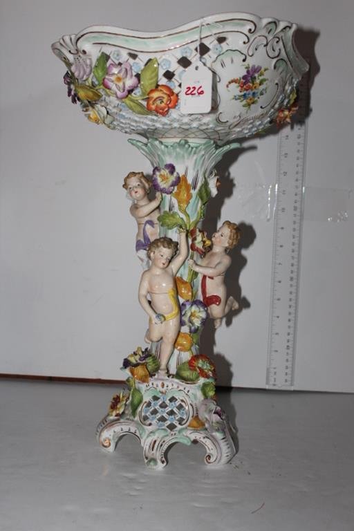Beautiful mkd. Dresden pedestal bowl with three cherubs: Beautiful mkd. Dresden pedestal bowl with three cherubs on the pedestal and applied flowers and hand painted decoration, chips 18"H no ref.#