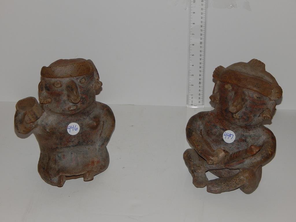 Pair of pre-Columbian clay figures of a man and woman: Pair of pre-Columbian clay figures of a man and woman 10"H, chip on the nose to one, ref.#446,447