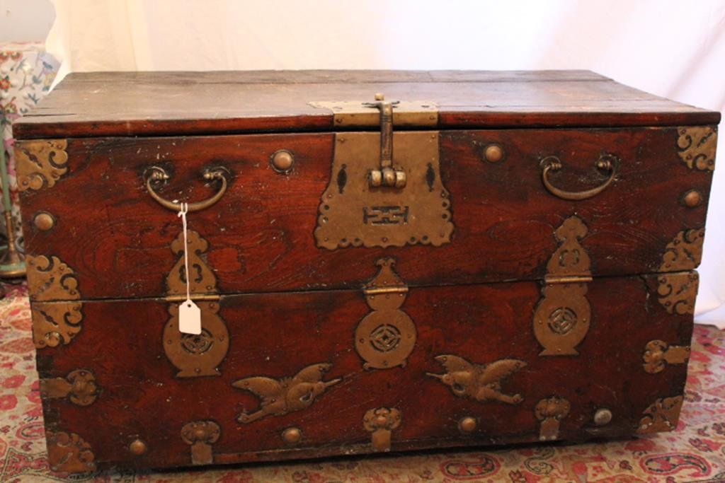 Early European pine box, with hand forged decorative: Early European pine box, with hand forged decorative brass lock and escutcheon, hinges, handles and two brass birds for decoration, dovetailed case, condition is good 20"H 34 1/4"L 16 1/2"D no ref.#