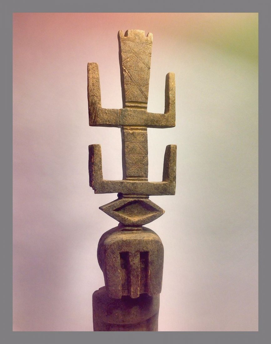 Dogon Kanaga mask Dancer sculpture, African Art: This is a wonderful older sculpture of a masked dancer from the Dogon tribe of Mali, West Africa.The sculpture is that of a Kanaga mask dancer shown with the traditional arms of the mask raised to the