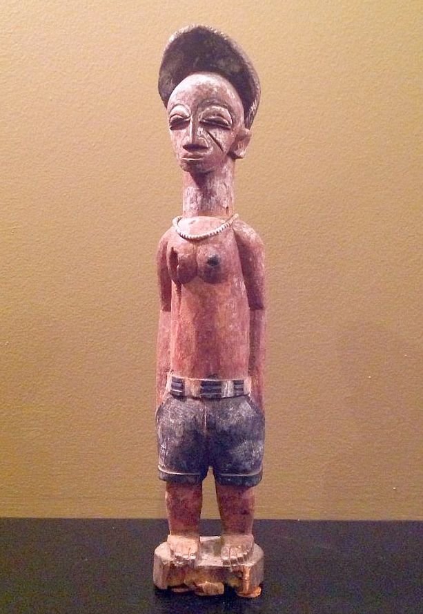 Old Baule Colonial sculpture,African Art ex Tobin coll.: This is a wonderful old colonial era carving from the Baule peoples of the Ivory Coast of west Africa.This is a very fine example of a colon figure with a well executed face and form , adorned with ol