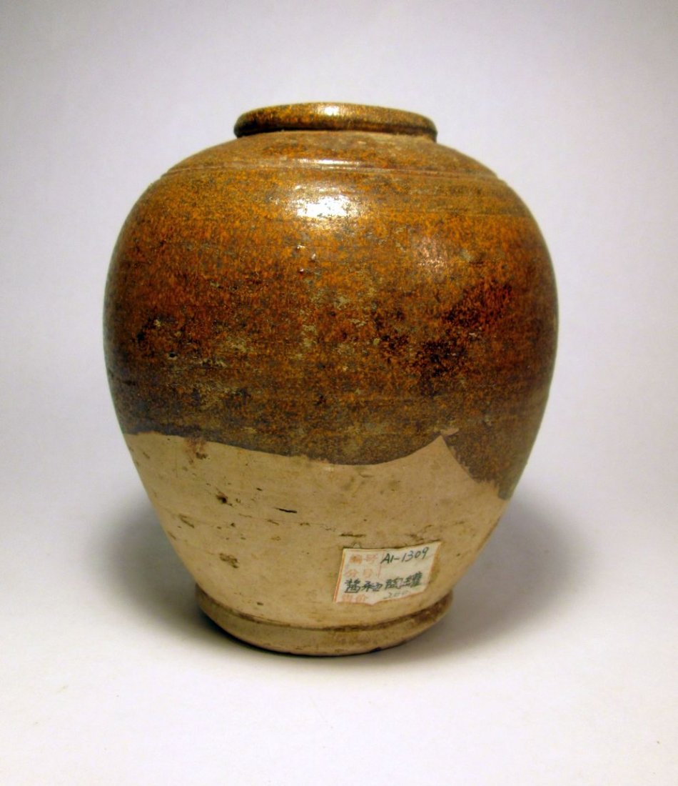 Ancient Chinese Brown Glazed Clay jar: Ancient clay ceramic jar from China, Likely dating to the Song Dynasty, 12th century or earlier.Measures 6 x 5 inches.Ex~ Steve Tobin Collection, Pennsylvania , USA