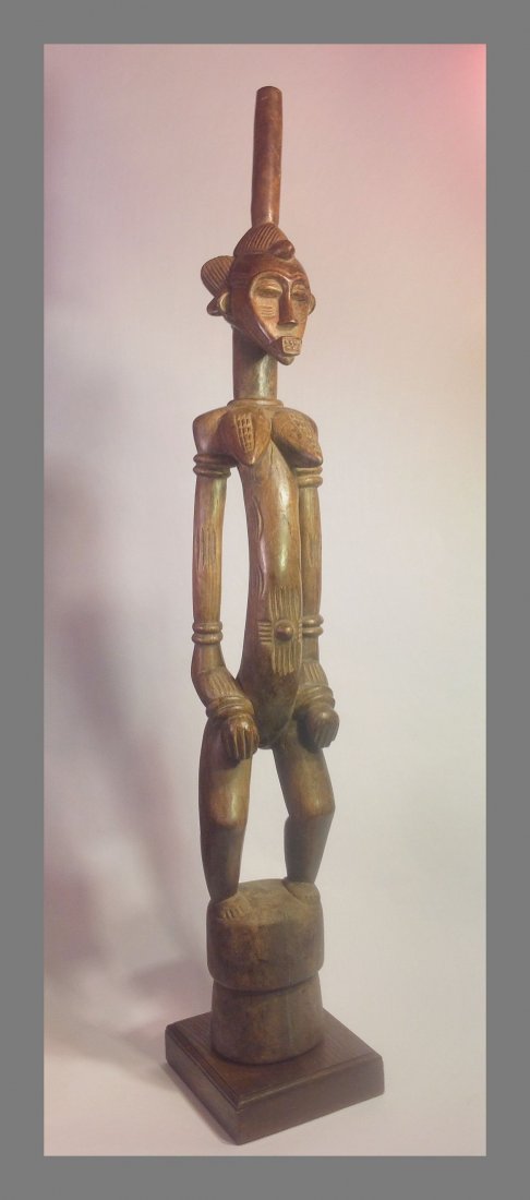 Senufo female Rhythm Pounder, African tribal Art: Finely carved tall Senufo female rhythm pounder sculpture from Mali, West Africa. measures 42 1/2 inches tall on custom display stand, professionally mounted. buyer pays for a 16 lb package.