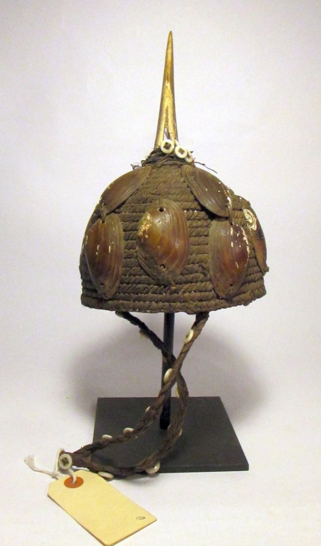 old Lega basketry hat with Avian beak & Shells: Old woven basketry hat from the Lega peoples of the Congo, Africa. Adorned with fresh water shells and old buttons. * Display stand Not Included.Measures 10 1/2 x 6 1/2 inches