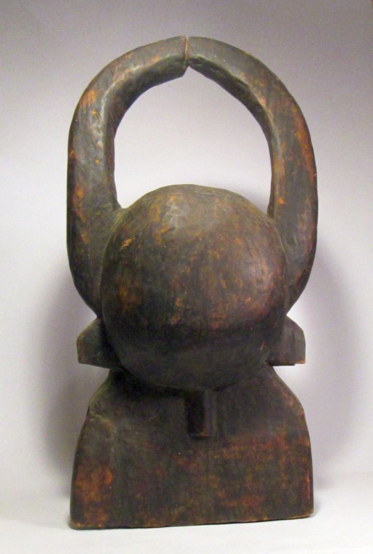 Chamba Bush Cow mask, Nigeria, African Art: Large Carved wooden helmet style mask of stylized "Bush Cow" from the Chamba culture of Nigeria. Measures 21 x 11 inches.Ex~ Steve Tobin Collection of African Art.