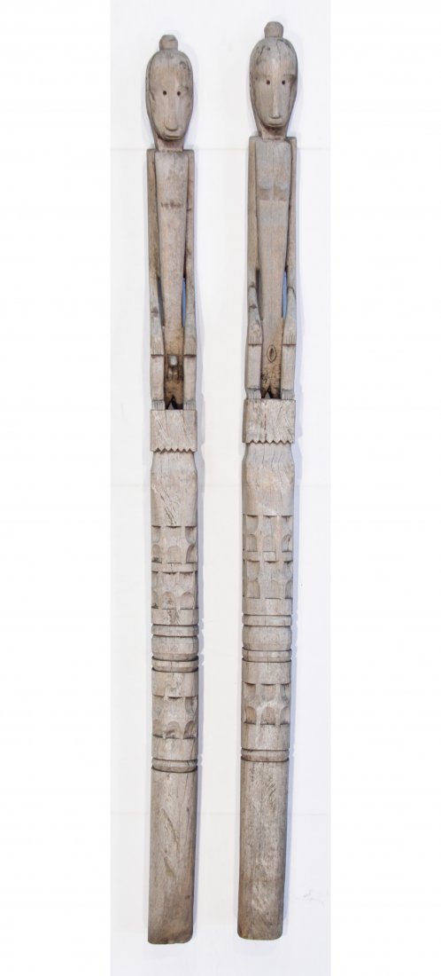 Huge pair of Ana Deo Guardian Posts Flores island: Truly HUGE pair of Ancestor posts from the island of Flores, Indonesia. Collected in 1994. Carved wood. Size: 81" x 4.5" x 5" (206 x 11 x 13 cm)These posts must be shipped by our 3rd party shipper.