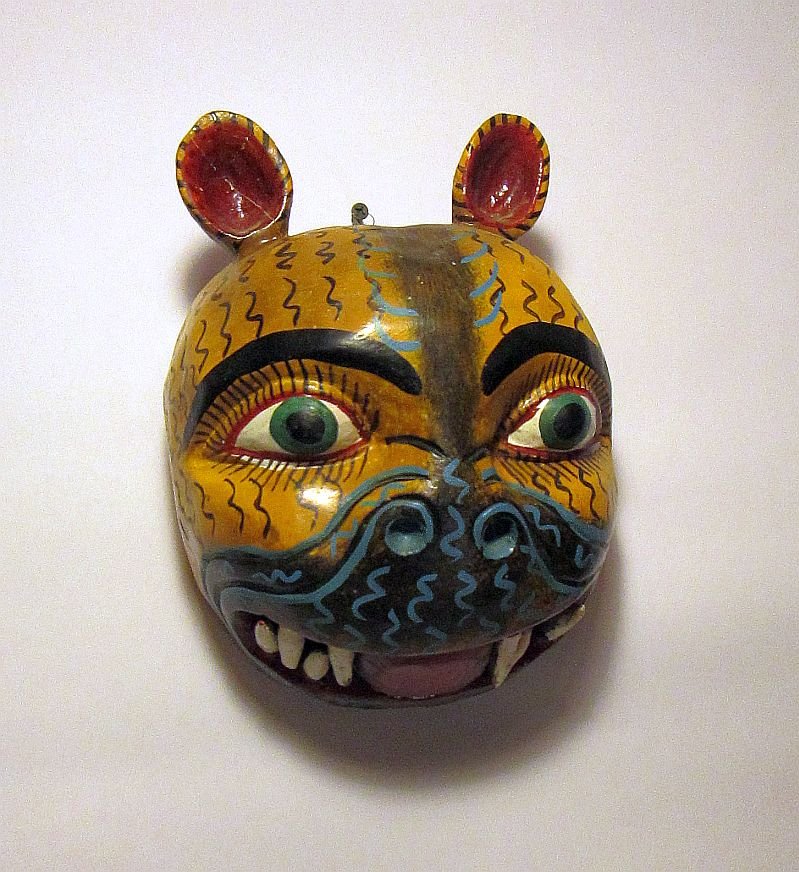 Old Mexican Folk Art Tiger mask: Old carved wooden folk art mask of a Tiger, collected in mexico in the 1980's by artist Steve Tobin. Measures 11 x 8 inches.