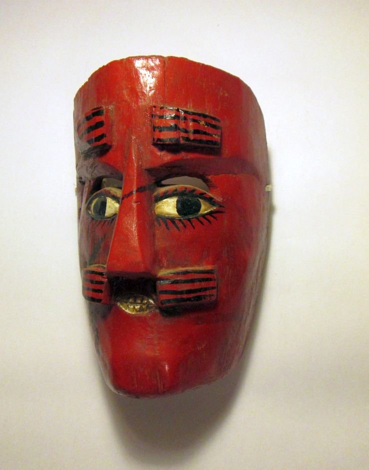Old Red faced Mexican Folk Dance mask: Carved wooden mask with Red face and painted scars. Collected in Mexico in the 1980's by Artist Steve Tobin.