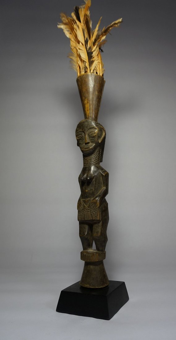 Very Rare Temne Ceremonial staff with Female Ancestor: A Very finely carved older scepter or ceremonial staff of a female ancestor figure with a tall Orange feather plume headdress, from the Temne peoples of Sierra Leone, West Africa. This wood sculpture 