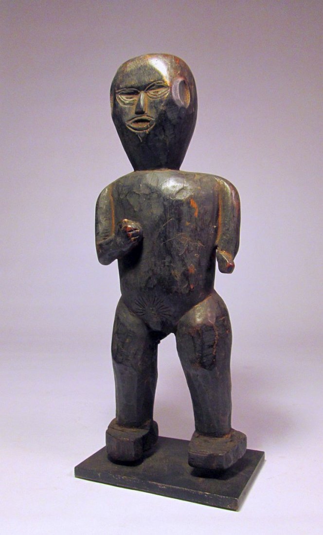 Old Nepal Wood idol, Magar Tribe, Middle Hills: Carved wooden male idol from Nepal. carved from a dense wood with one hand to chest, classic facial style and linear designs around the phallus, suggesting a type of fertility fetish(?) Custom Mounted