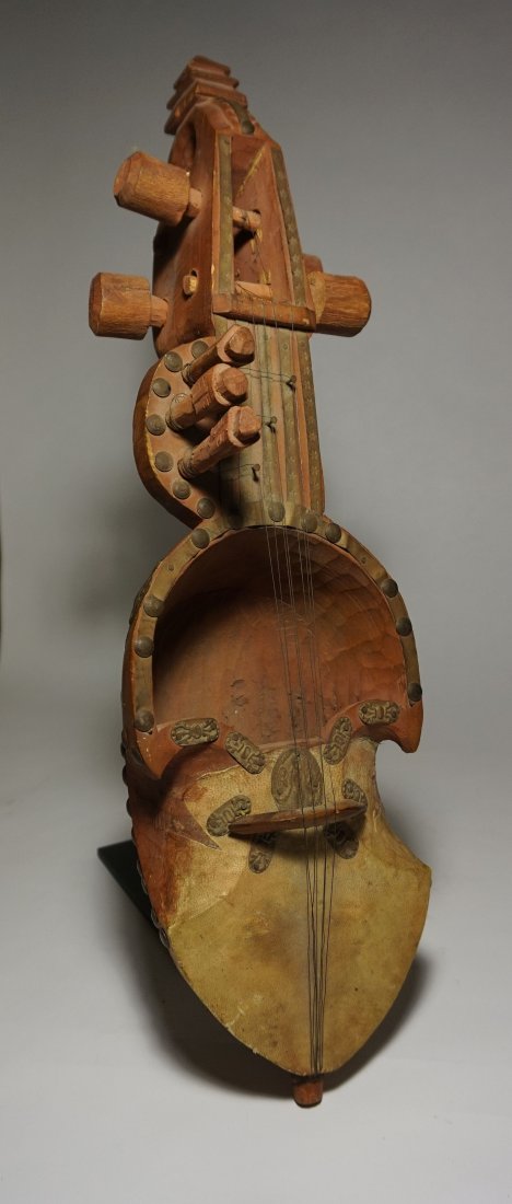 Very Old Nepal Sarangi Musical Instrument: A fine Old Nepalese Sarangi.Traditional Nepali sarangi are made up of a single piece of wood having a neck and hollowed-out double-chambered body; they are often made from a very light wood called khi