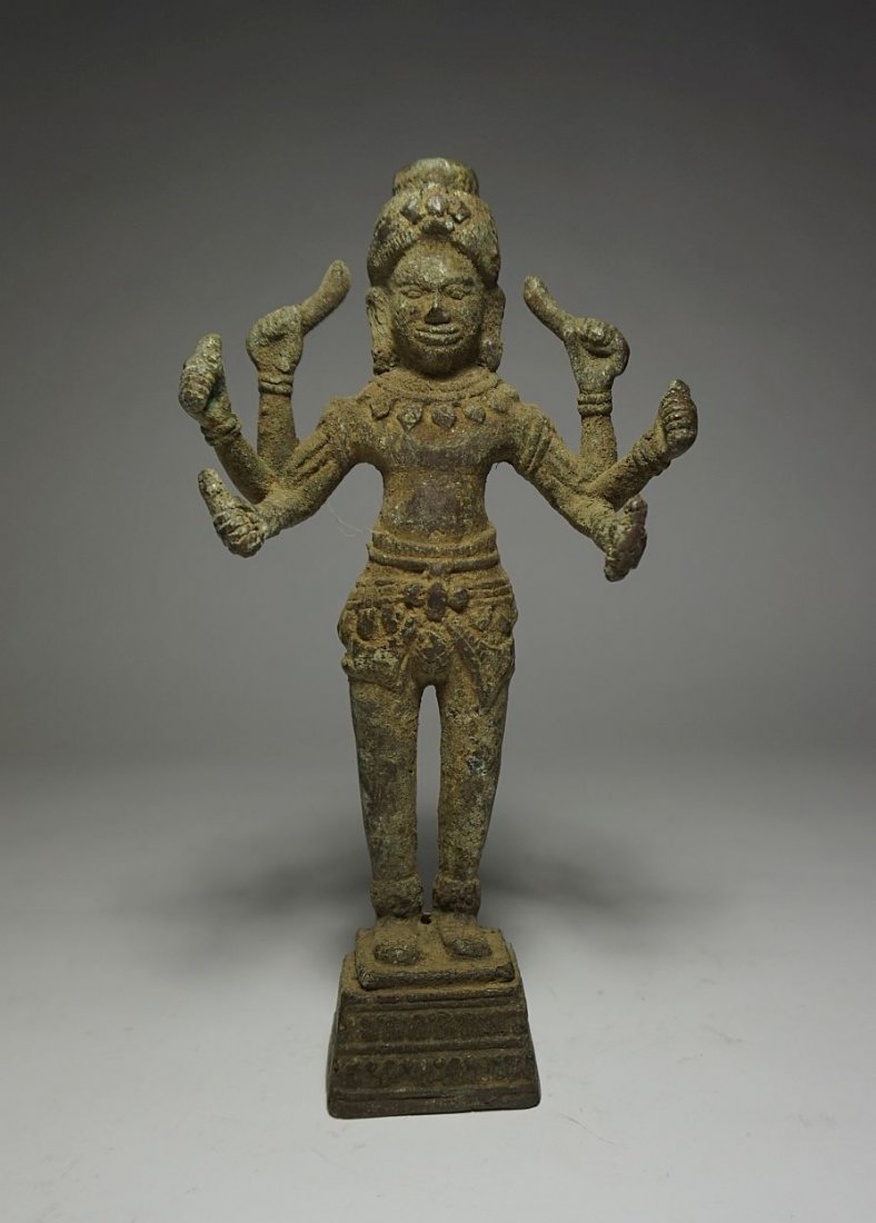 Very Old Buddhist / Hindu bronze , likely from Cambodia: This is a very Old Hindu or Buddhist style bronze from South east Asia and appears to be from Cambodia.The bronze has a undeniable heavy patina from burial and is not a new reproduction, it could be h