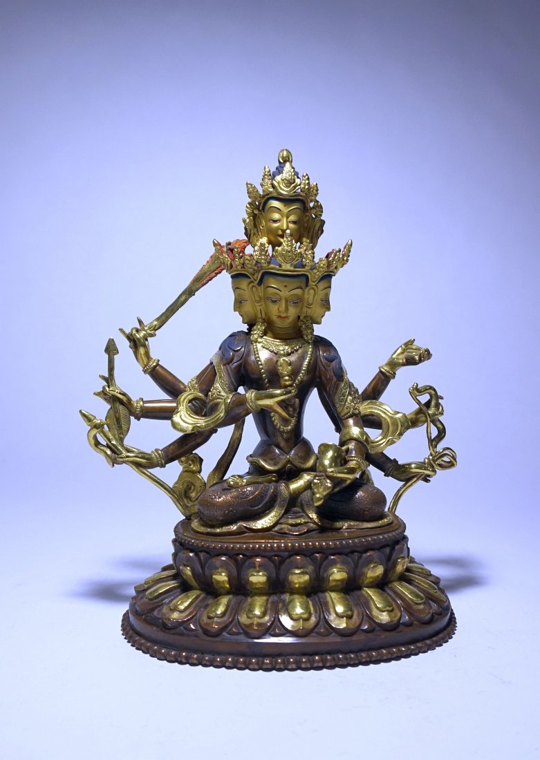 8 Arm Tibetan Buddhist Gilt Bronze statue, Buddha: Gorgeous Vintage Buddhist sculpture from Tibet or Nepal. This is a stunning high quality gilt bronze with serene facial expressions and incredible details. The bronze features a multi headed Buddhist 