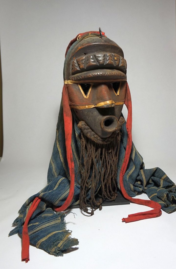 Dan African Mask with long headdress, African Art: Vintage carved wooden mask with long woven indigo textile headdress attached. mask itself measures 10 x 6 , hanging textile is 31 inches long.