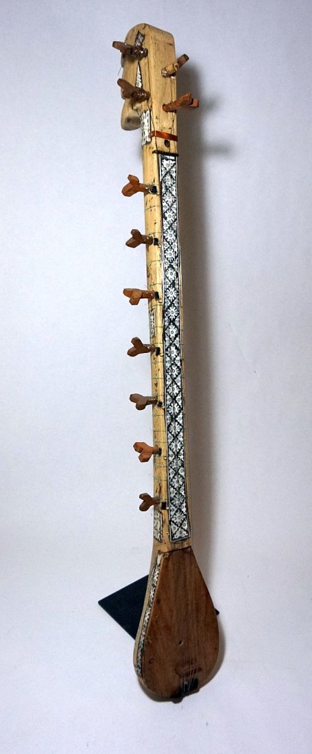 Rare Old Karakalpakstan dutar Uzbekistan Instrument: Rare old Wooden and inlaid bone instrument from Uzbekistan. The area in the West of Uzbekistan is called Karakalpakstan. Here a different type of Uzbek dutar the Karakalpakstan dutar. It is smaller th