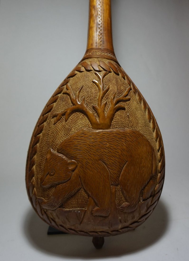 Rare & Beautiful Carved Gusle Yugoslavian folk fiddle.: Carved wooden instrument known as a Gusle , a single stringed instrument. This ornately carved example is missing its string, it is otherwise in playable condition, and has the bridge still tied to th