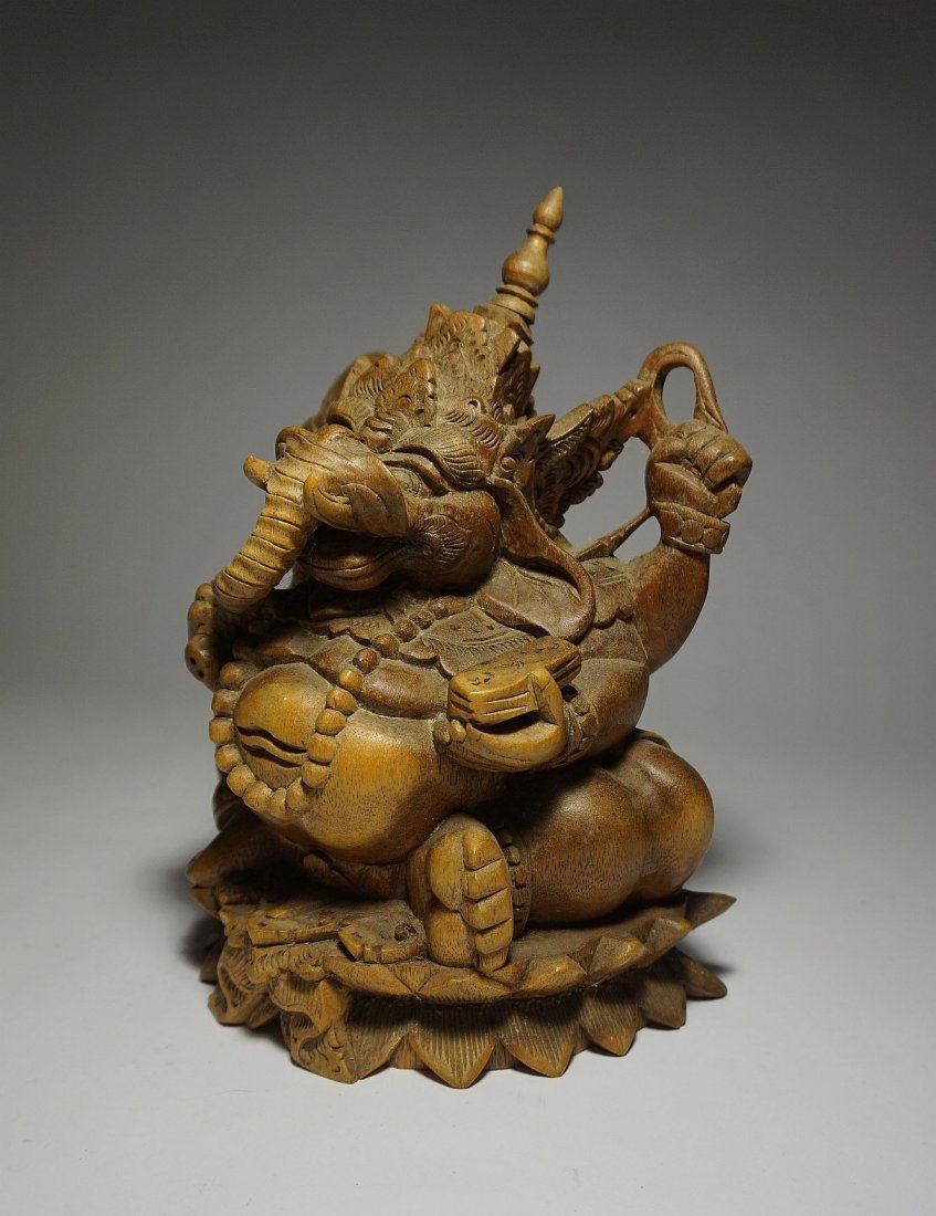 Beautiful Ornate Ganesh sculpture from Bali, Ganesha: Vintage Carved wood sculpture of Ganesh , the son of Shiva. A Very Ornate and elaborate example from Bali, Indonesia. Measures 7 Inches tall.