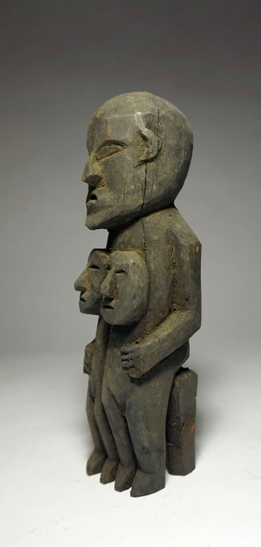 Naga Hill Tribe carved Mother and Children , India art: Carved wooden idol of a Mother and children from the Naga peoples of Northern India. Measures 5 inches tall