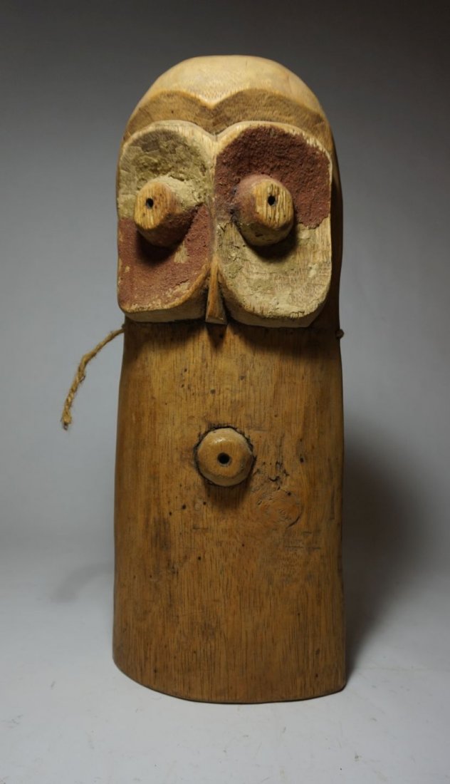 Abstract Bembe African mask, African Art: Tall carved wooden mask with large Owl like eyes accented with red mineral pigment. A Primitive and interesting example of African Art from the Congo, DRC , central Africa. Measures 15 x 5 1/2 inches.