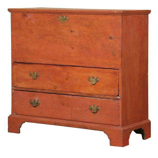Early 1800's two drawer blanket chest, New England: Early 1800's two drawer blanket chest, New England, white pine, two dovetail drawers in base, strap hinges on lid top, molded bracket feet, rosette nails,43"w, 40"t, 17"d. Old red stain. Later pulls.