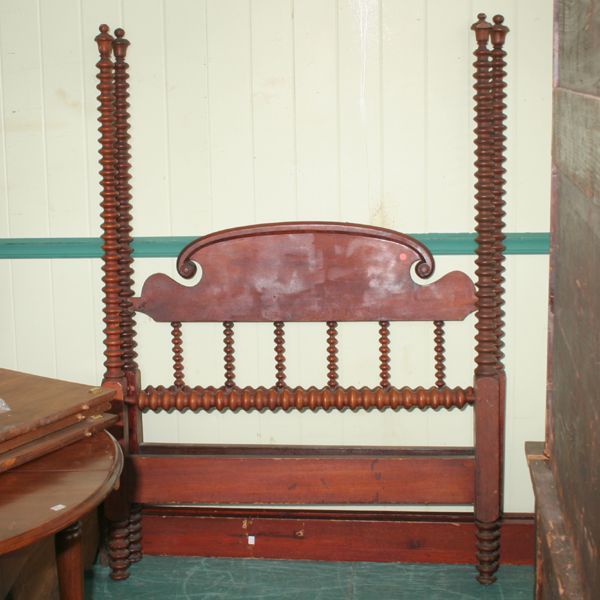 Late 19th Century single size Victorian poster be: Late 19th Century single size Victorian poster bed, solid walnut, spool turned, 67"t posts, open spool turned headboard, arched crest, inside is 42" x 73",outside is 48" x 82". Original crazed finish.