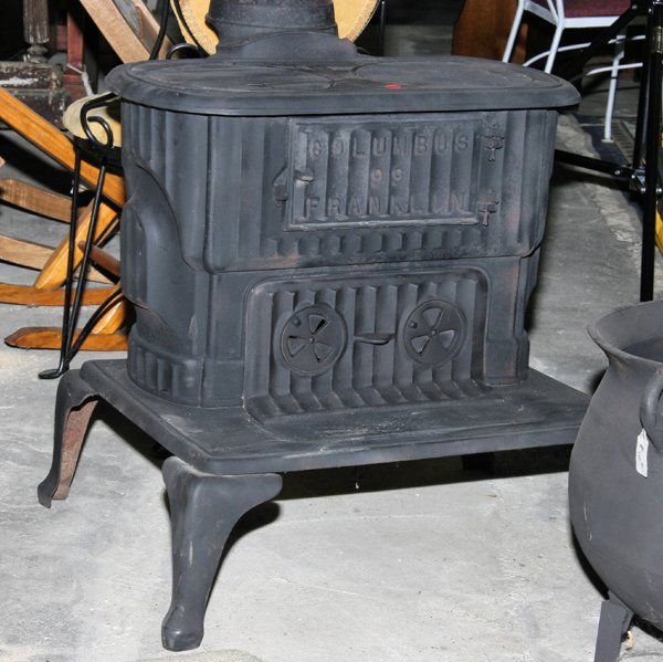 1120 Old cast iron Franklin stove, "Columbus 99 Frankl