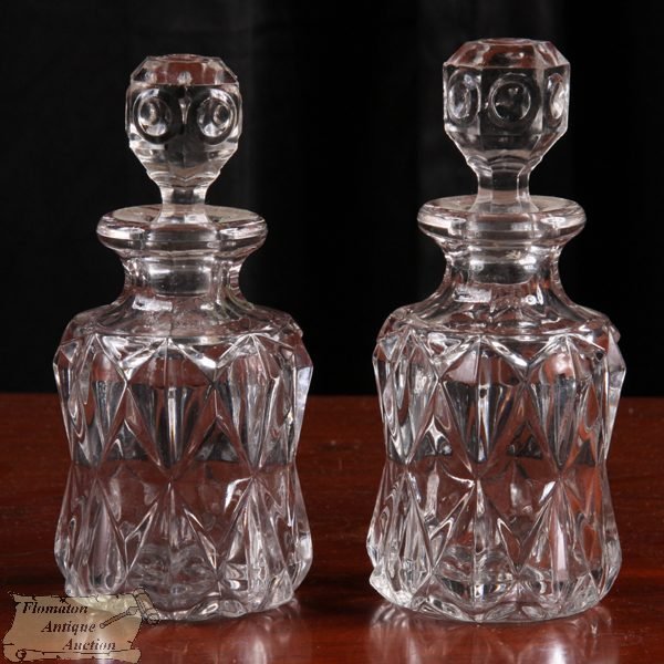 Pair of pattern glass cologne bottles, diamond pan