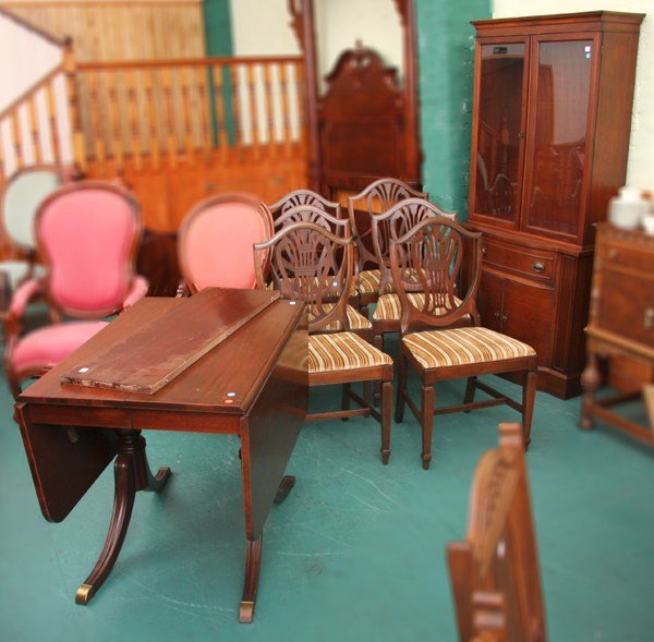 Mid 1900 eight piece dining set, mahogany, Duncan: Mid 1900 eight piece dining set, mahogany, Duncan Phyfe style, drop leaf table with 12" leaf and pads, 38" x 26", 16" drop leaves, six shield back chairs, 39" tall (one arm), small bow front china 73"
