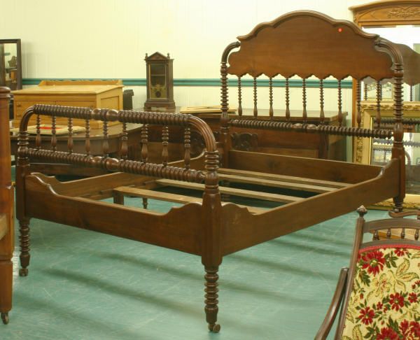 Late 1800 bed frame complete with footboard, spoo: Late 1800 bed frame complete with footboard, spool turned. ………………We are a live "brick/mortar" auction house, as such we are selling to a live in-house audience that has viewed the items an