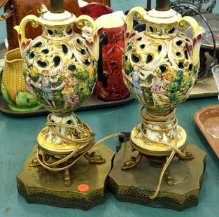 Pair of porcelain hand painted lamps, garden scen: Pair of porcelain hand painted lamps, garden scene, 27"t. ………………We are a live "brick/mortar" auction house, as such we are selling to a live in-house audience that has viewed the items
