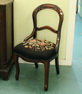 Mid 1800 Victorian balloon back side chair, solid: Mid 1800 Victorian balloon back side chair, solid walnut, finger carved crest, old needle point upholstery, 35"t 19"w 20"d. Good original finish/condition. ………………We are a live