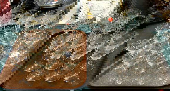 33 pieces of cut stemware, 12 martini glasses, 12: 33 pieces of cut stemware, 12 martini glasses, 12 wines, 4 waters, 5 sherbets, mismatched. ………………We are a live "brick/mortar" auction house, as such we are selling to a live in-house