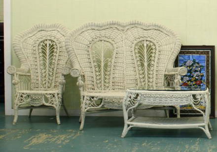 Mid 1900 Victorian style wicker suite, 50"t scal: Mid 1900 Victorian style wicker suite, 50"t scalloped rolled backs and arm, open arch center with curly-que decorations, 1-54" loveseat, 2-two arm chairs 34"w,3-coffee table 36" x 20"