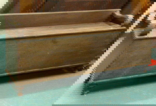 Mid 1800 Empire wood box/settee, dove tail case, l: Mid 1800 Empire wood box/settee, dove tail case, lift top, 7" back with unusual ogee scroll arms, turned feet, 69"l 30"t 20"d. Old weathered finish, wood loss at back of right arm. ………………W