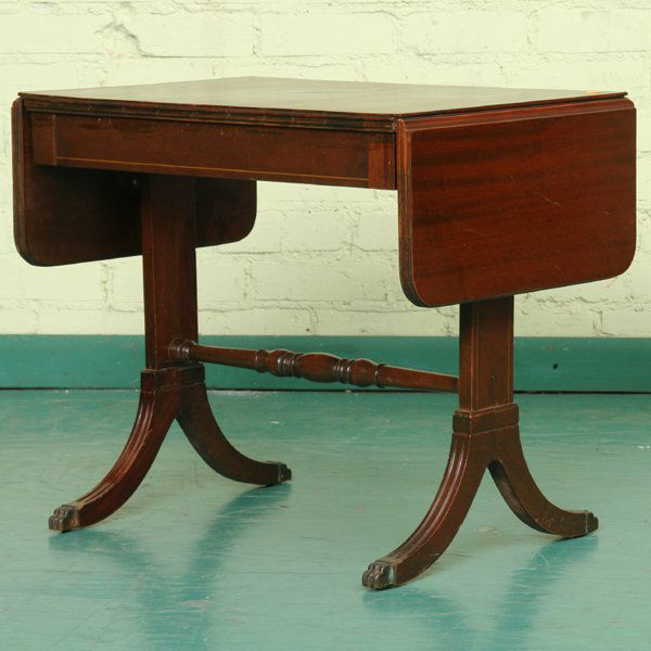 Mid 1900 unusual Duncan Phyfe style coffee table/: Mid 1900 unusual Duncan Phyfe style coffee table/miniature sofa table, mahogany, reeded top, drop leaves on both ends, inlay skirt, double pedestal base, reeded saber legs, brass paw feet, turned stre
